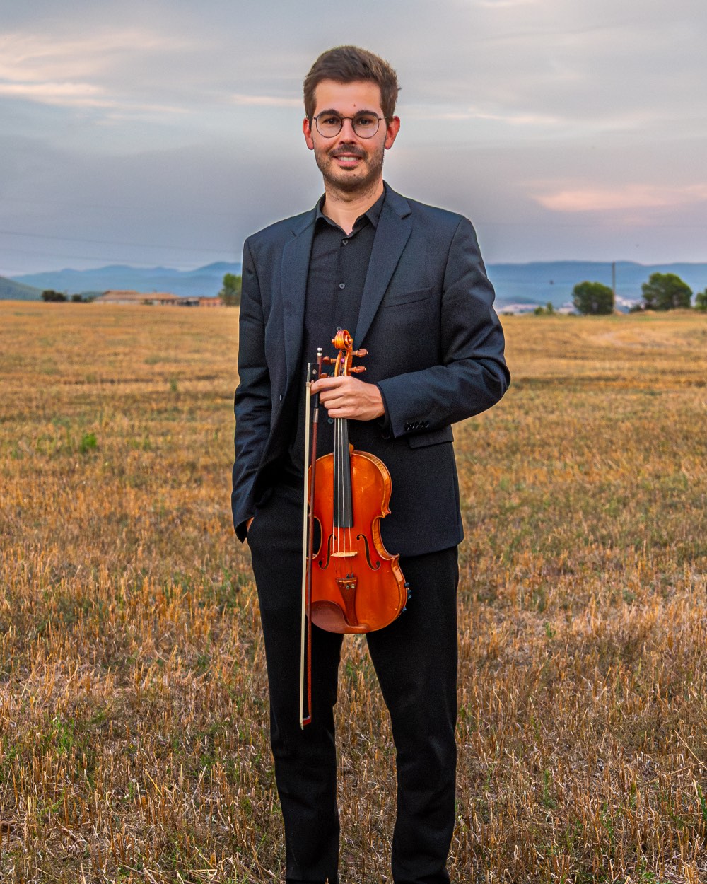 Violinista d'Artium Trio tocant en un casament